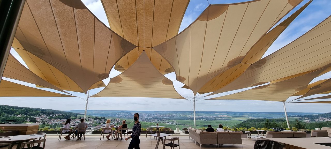 Sand-coloured sails above the vines, Champagne