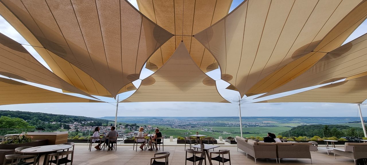 Sand-coloured sails above the vines, Champagne