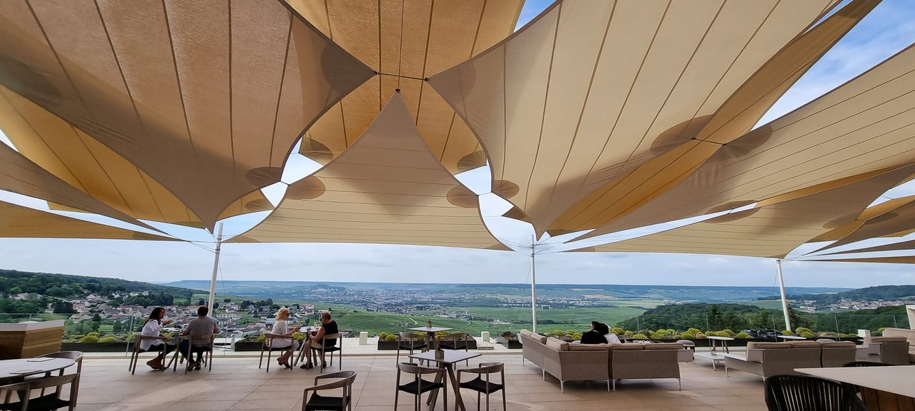 Sand-coloured sails above the vines, Champagne