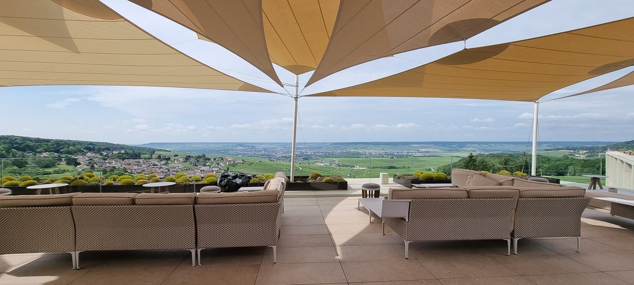 Sand-coloured sails above the vines, Champagne